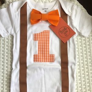 BRAND NEW, one year old onesie